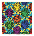 Colorful pattern of Medusa heads on a blue background
