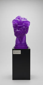 Purple sculpture on a black pedestal against a gray background