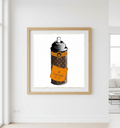 Framed artwork of a spray can with an orange label on a white wall.
