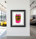 Framed artwork of a pink can with Lamborghini logo in a car showroom.