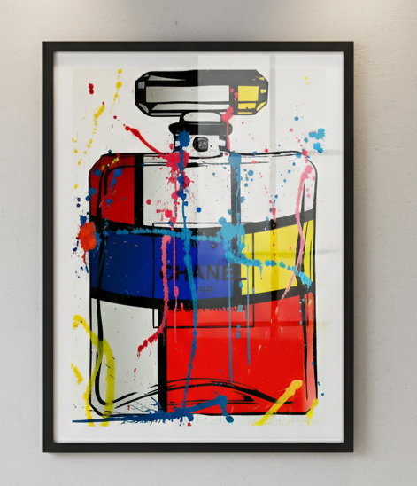 Framed artwork of a colorful Chanel perfume bottle design on a white background