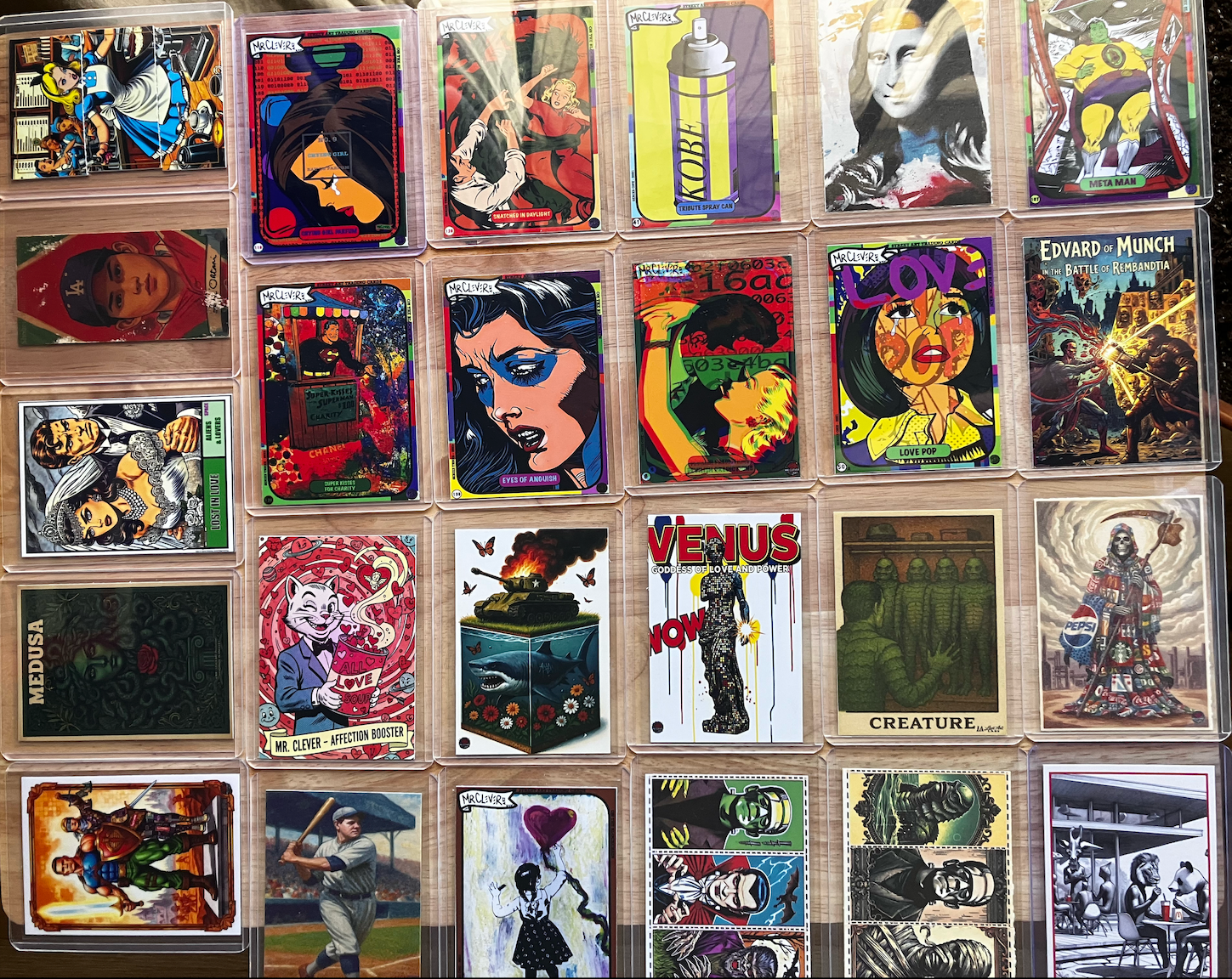 A grid of collectible trading cards displayed in clear protective cases, featuring various illustrated characters and comic-style artwork.