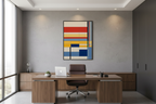 Geometric abstract art print displayed in elegant executive office setting