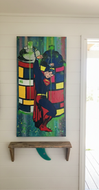 Superman character being held by a spray can with colorful background