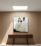 Modern interior with a wooden console table and abstract artwork on a striped wall.